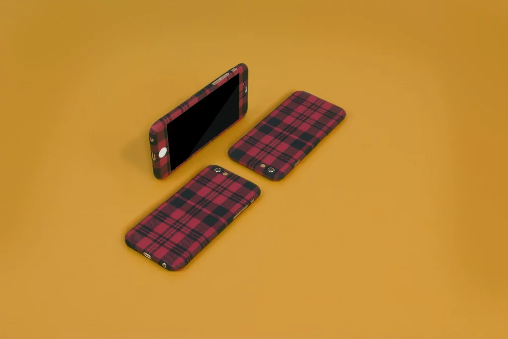 3 iphones on a yellow background