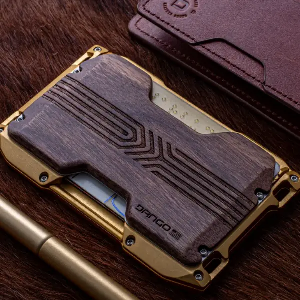 Dango A-Series Walnut Backplate wallet next to pen and pull pocket